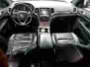2014 Jeep Grand Cherokee Limited z VIN 1C4RJFBG1EC534664, wystawiony jako Copart lot #69820215 z przebiegiem 120 688 mil mil oraz Szkoda całkowita • Salvage title. Historia ofert i sprzedaży dostępna na DreamBid. Obrazek 8.