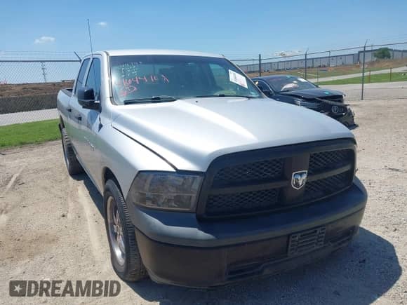 2012 Ram 1500 Tradesman z VIN 1C6RD6FP2CS168791, wystawiony jako IAAI lot #41644108 z przebiegiem 211 029 mil mil oraz . Historia ofert i sprzedaży dostępna na DreamBid. Obrazek 1.