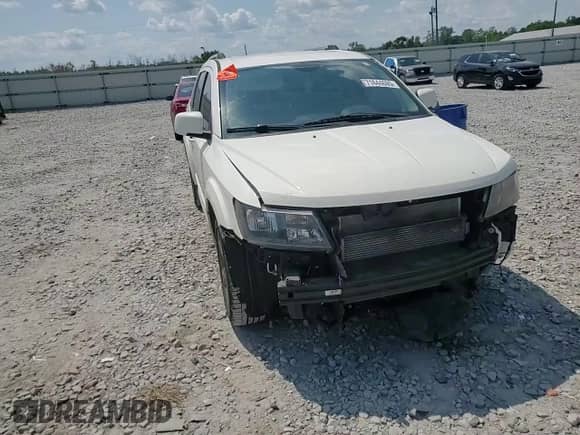 2015 Dodge Journey Crossroad with VIN 3C4PDCGG1FT565389, listed as a Copart auction lot 71644695 with 121,142 mi miles and Salvage title. Bid and sale history available at DreamBid. Image 14.
