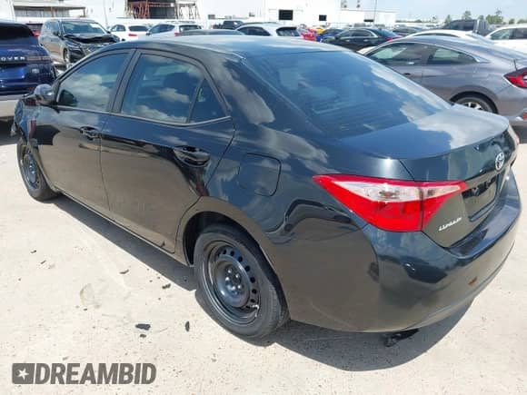 2019 Toyota Corolla L with VIN 5YFBURHEXKP867822, listed as a IAAI auction lot 43062432 with 101,406 mi miles and . Bid and sale history available at DreamBid. Image 3.
