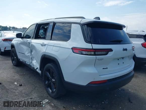 2023 Jeep Grand Cherokee Altitude with VIN 1C4RJKAG4P8847885, listed as a IAAI auction lot 42346718 with 52,318 mi miles and . Bid and sale history available at DreamBid. Image 3.