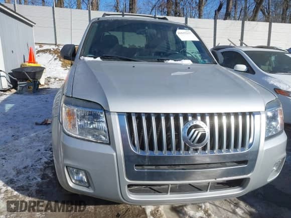 2008 Mercury Mariner with VIN 4M2CU91Z68KJ45797, listed as a IAAI auction lot 41615117 with 87,936 mi miles and . Bid and sale history available at DreamBid. Image 14.