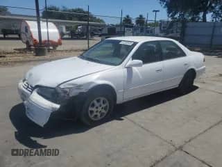 1997 Toyota Camry LE with VIN JT2BG22K3V0042340, listed as a Copart auction lot 67252935 with 216,842 mi miles and Salvage title. Bid and sale history available at DreamBid. Image 1.