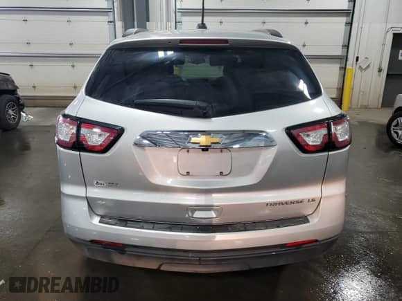 2016 Chevrolet Traverse LS с VIN 1GNKRFKD0GJ344327, выставлен на аукционе Copart как лот 68499535 с пробегом 103 039 миль миль и Списание • Salvage title. История ставок и продаж доступна на DreamBid. Изображение 6.