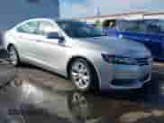 2017 Chevrolet Impala LT z VIN 1G1105S37HU210536, wystawiony jako IAAI lot #43265606 z przebiegiem 147 505 mil mil oraz . Historia ofert i sprzedaży dostępna na DreamBid. Obrazek 1.