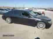2007 BMW 7 Series 750Li with VIN WBAHN83567DT72887, listed as a Copart auction lot 57689855 with 146,254 mi miles and Clean title. Bid and sale history available at DreamBid. Image 4.