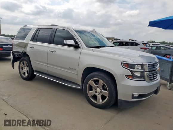 2017 Chevrolet Tahoe Premier with VIN 1GNSCCKC0HR158734, listed as a Copart auction lot 71042885 with 127,552 mi miles and Salvage title. Bid and sale history available at DreamBid. Image 4.