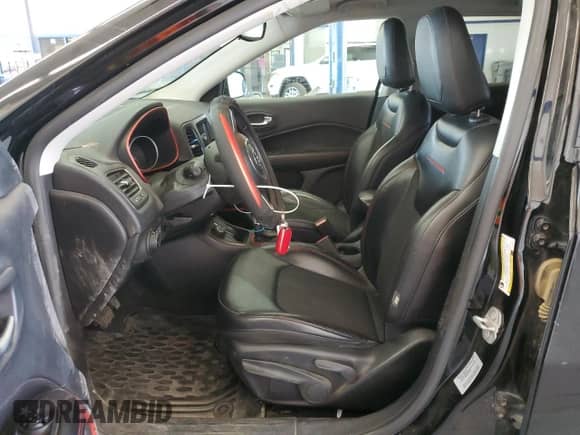 2017 Jeep Compass Trailhawk with VIN 3C4NJDDBXHT647011, listed as a Copart auction lot 65583185 with 106,438 mi miles and Salvage title. Bid and sale history available at DreamBid. Image 7.