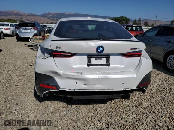 2023 BMW i4 eDrive40 with VIN WBY73AW0XPFP34797, listed as a Copart auction lot 81901885 with 16,966 mi miles and Salvage title. Bid and sale history available at DreamBid. Image 6.