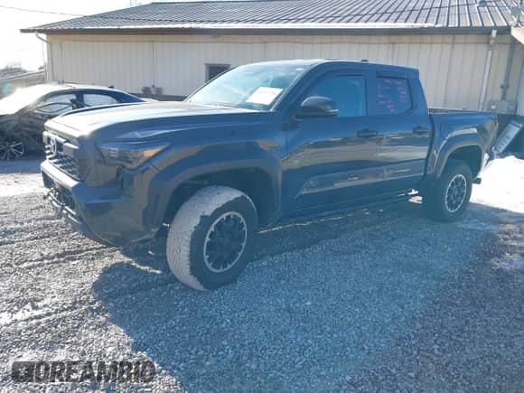 2024 Toyota Tacoma SR5 with VIN 3TYLB5JN6RT026356, listed as a IAAI auction lot 41432726 with 6,414 mi miles and . Bid and sale history available at DreamBid. Image 18.