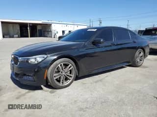 2018 BMW 7 Series 740e xDrive with VIN WBA7J2C50JG938505, listed as a Copart auction lot 50485725 with 94,535 mi miles and Salvage title. Bid and sale history available at DreamBid. Image 1.