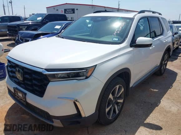 2023 Honda Pilot Touring с VIN 5FNYG2H7XPB014852, выставлен на аукционе IAAI как лот 42998684 с пробегом 22 642 миль миль и . История ставок и продаж доступна на DreamBid. Изображение 2.