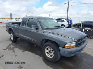 2003 Dodge Dakota with VIN 1D7HL12X73S232832, listed as a IAAI auction lot 43367798 with 213,084 mi miles and . Bid and sale history available at DreamBid. Image 1.