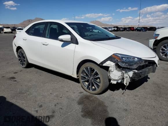 2019 Toyota Corolla L с VIN 2T1BURHE7KC218723, выставлен на аукционе Copart как лот 84427115 с пробегом 124 830 миль миль и Списание • Salvage title. История ставок и продаж доступна на DreamBid. Изображение 4.