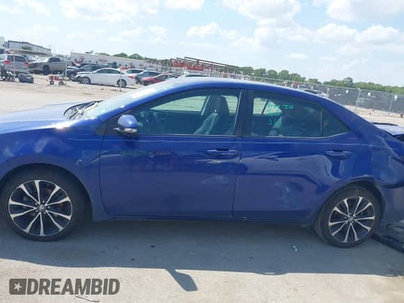 2019 Toyota Corolla L with VIN 5YFBURHE3KP924037, listed as a IAAI auction lot 43111293 with 182,928 mi miles and . Bid and sale history available at DreamBid. Image 14.