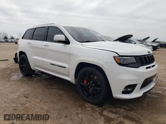 2021 Jeep Grand Cherokee SRT with VIN 1C4RJFDJ7MC577624, listed as a Copart auction lot 54864645 with 12,546 mi miles and Salvage title. Bid and sale history available at DreamBid. Image 4.