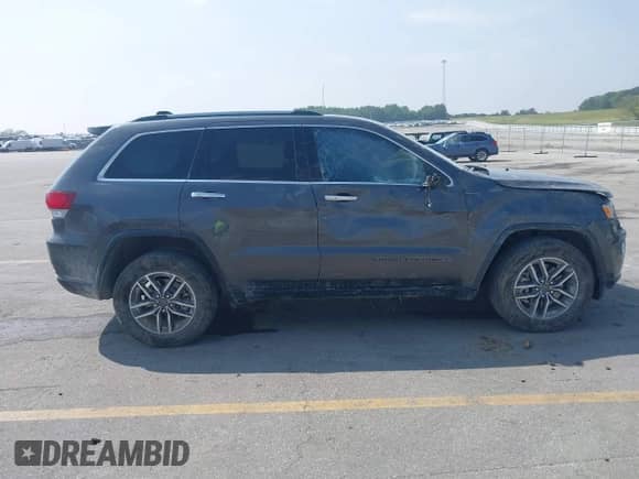 2021 Jeep Grand Cherokee 80th Anniversary with VIN 1C4RJFBG9MC550786, listed as a IAAI auction lot 43150307 with 63,701 mi miles and . Bid and sale history available at DreamBid. Image 13.