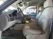 2009 Chevrolet Tahoe 2LT z VIN 1GNFK23049R104731, wystawiony jako Copart lot #70754315 z przebiegiem 168 780 mil mil oraz Szkoda całkowita • Salvage title. Historia ofert i sprzedaży dostępna na DreamBid. Obrazek 7.
