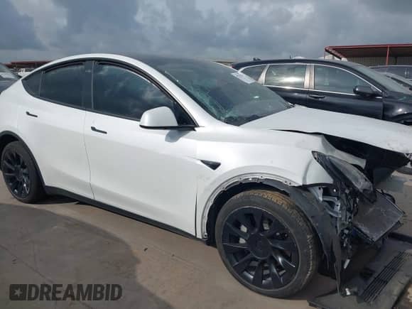 2023 Tesla Model Y Long Range с VIN 7SAYGDEE2PA071402, выставлен на аукционе IAAI как лот 42729170 с пробегом 31 865 миль миль и . История ставок и продаж доступна на DreamBid. Изображение 14.