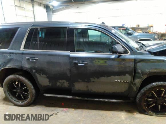 2019 Chevrolet Tahoe LS with VIN 1GNSKAEC6KR121486, listed as a IAAI auction lot 41064193 with 118,108 mi miles and . Bid and sale history available at DreamBid. Image 14.