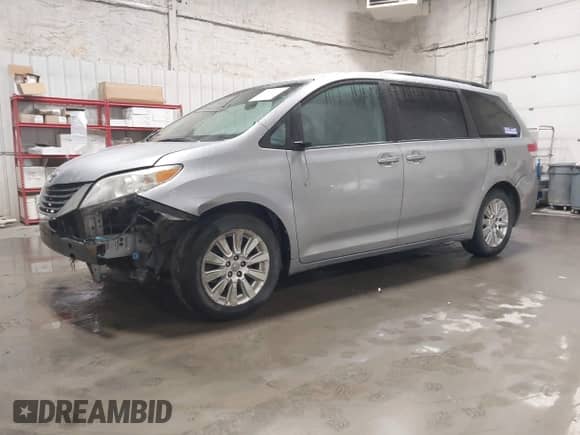 2011 Toyota Sienna LE with VIN 5TDJK3DC7BS003725, listed as a IAAI auction lot 42867126 with 165,953 mi miles and . Bid and sale history available at DreamBid. Image 2.