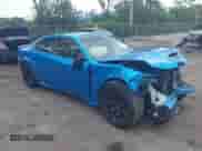 2023 Dodge Charger SRT Hellcat Redeye Widebody with VIN 2C3CDXL90PH626288, listed as a IAAI auction lot 42586096 with 20,758 mi miles and . Bid and sale history available at DreamBid. Image 1.