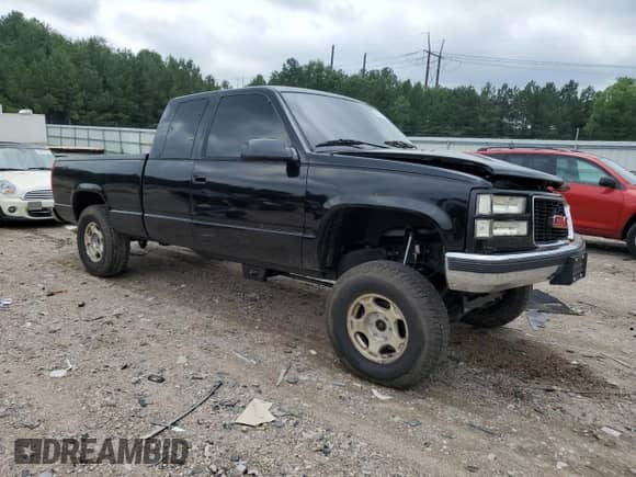 1997 GMC Sierra 1500 with VIN 1GTEK19R4VE502673, listed as a Copart auction lot 63619335 with 225,758 mi miles and Salvage title. Bid and sale history available at DreamBid. Image 4.