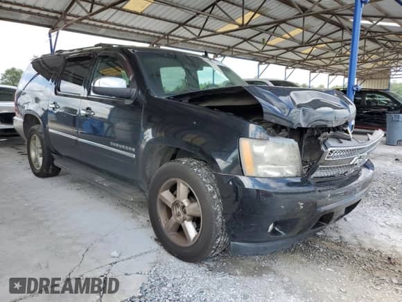 2011 Chevrolet Suburban LTZ с VIN 1GNSKKE33BR303720, выставлен на аукционе Copart как лот 68343425 с пробегом 201 762 миль миль и Списание • Salvage title. История ставок и продаж доступна на DreamBid. Изображение 4.