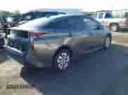 2018 Toyota Prius Two Eco with VIN JTDKARFU1J3067548, listed as a IAAI auction lot 43238379 with 146,282 mi miles and . Bid and sale history available at DreamBid. Image 4.