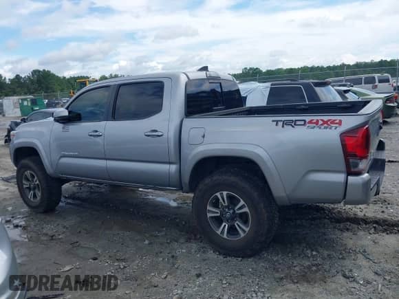 2019 Toyota Tacoma SR z VIN 3TMCZ5AN8KM287646, wystawiony jako IAAI lot #42969397 z przebiegiem 100 562 mil mil oraz . Historia ofert i sprzedaży dostępna na DreamBid. Obrazek 14.