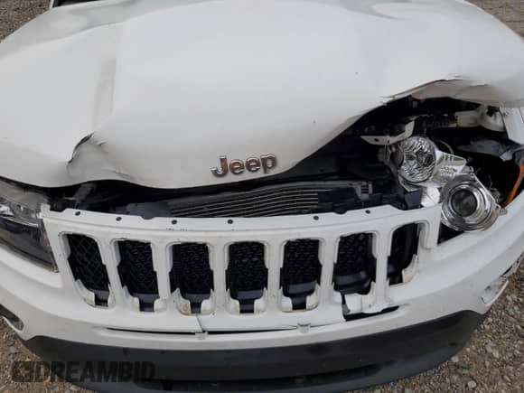 2014 Jeep Compass Limited z VIN 1C4NJDCB3ED500919, wystawiony jako Copart lot #63126535 z przebiegiem 99 312 mil mil oraz Szkoda całkowita • Salvage title. Historia ofert i sprzedaży dostępna na DreamBid. Obrazek 12.