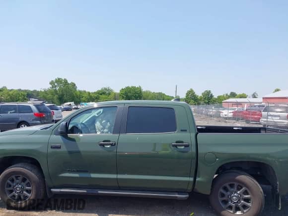 2021 Toyota Tundra SR5 with VIN 5TFDY5F19MX023796, listed as a IAAI auction lot 42423231 with 59,149 mi miles and . Bid and sale history available at DreamBid. Image 14.