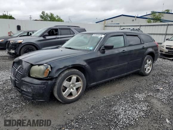 2005 Dodge Magnum SXT with VIN 2D4GZ48V85H576310, listed as a Copart auction lot 61059975 with 175,541 mi miles and Salvage title. Bid and sale history available at DreamBid. Image 1.