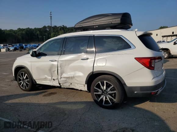 2022 Honda Pilot Touring 7-Passenger with VIN 5FNYF5H61NB003005, listed as a Copart auction lot 66857355 with 49,813 mi miles and Salvage title. Bid and sale history available at DreamBid. Image 2.