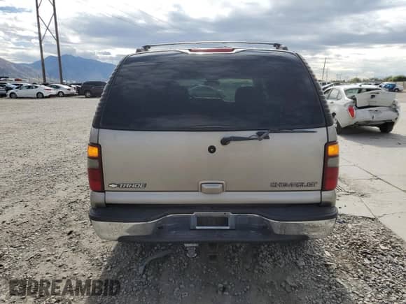 2001 Chevrolet Tahoe LT with VIN 1GNEK13T21J246434, listed as a Copart auction lot 85704855 with 230,449 mi miles and Salvage title. Bid and sale history available at DreamBid. Image 6.