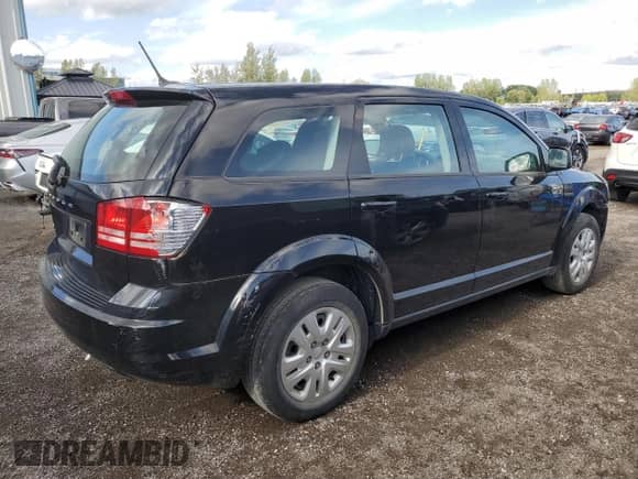 2018 Dodge Journey SE with VIN 3C4PDCAB5JT157399, listed as a Copart auction lot 71086205 with 73,479 mi miles and Salvage title. Bid and sale history available at DreamBid. Image 3.
