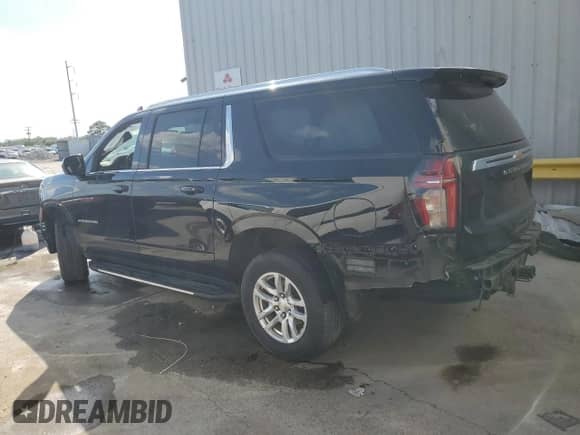 2022 Chevrolet Suburban LS with VIN 1GNSCBKD1NR271963, listed as a Copart auction lot 52889005 with 106,922 mi miles and Salvage title. Bid and sale history available at DreamBid. Image 2.