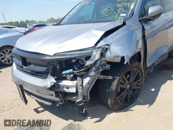 2022 Honda Pilot Special Edition with VIN 5FNYF5H2XNB034783, listed as a IAAI auction lot 43195248 with 56,028 mi miles and . Bid and sale history available at DreamBid. Image 6.