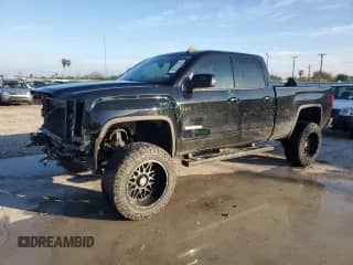 2018 GMC Sierra 1500 with VIN 1GTR1LEH7JZ365423, listed as a Copart auction lot 83223204 with 73,315 mi miles and Salvage title. Bid and sale history available at DreamBid. Image 1.