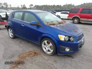 2013 Chevrolet Sonic LTZ with VIN 1G1JE6SB9D4230120, listed as a IAAI auction lot 41466852 with 83,953 mi miles and . Bid and sale history available at DreamBid. Image 1.