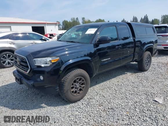 2018 Toyota Tacoma SR5 z VIN 5TFSZ5AN2JX151257, wystawiony jako IAAI lot #42895721 z przebiegiem 157 990 mil mil oraz . Historia ofert i sprzedaży dostępna na DreamBid. Obrazek 17.