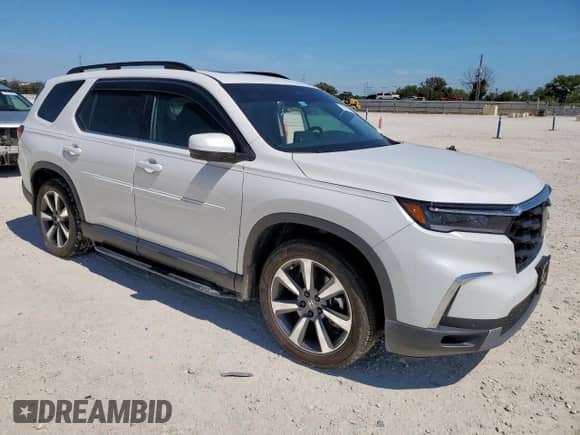 2025 Honda Pilot Elite z VIN 5FNYG1H83SB077240, wystawiony jako Copart lot #71985575 z przebiegiem 7 176 mil mil oraz Szkoda całkowita • Salvage title. Historia ofert i sprzedaży dostępna na DreamBid. Obrazek 4.