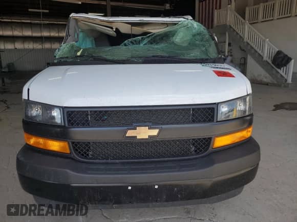 2023 Chevrolet Express Cargo z VIN 1GCWGBFP1P1249384, wystawiony jako Copart lot #64176105 z przebiegiem Nie podano mil oraz Szkoda całkowita • Salvage title. Historia ofert i sprzedaży dostępna na DreamBid. Obrazek 5.