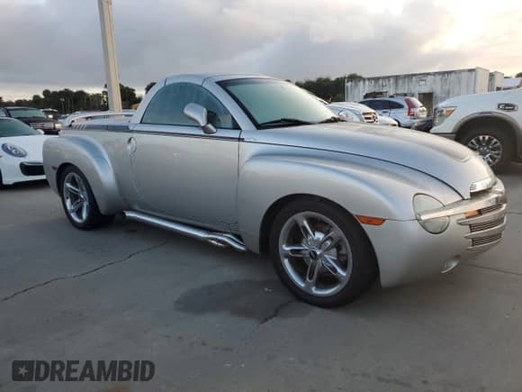 2004 Chevrolet SSR LS с VIN 1GCES14P14B105315, выставлен на аукционе Copart как лот 74983944 с пробегом Не указан миль и Списание • Salvage title. История ставок и продаж доступна на DreamBid. Изображение 4.