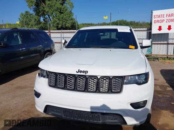 2020 Jeep Grand Cherokee Altitude with VIN 1C4RJFAG3LC138086, listed as a IAAI auction lot 42868729 with 77,706 mi miles and . Bid and sale history available at DreamBid. Image 12.