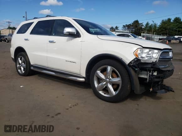 2012 Dodge Durango Citadel с VIN 1C4RDJEG5CC337208, выставлен на аукционе Copart как лот 81814985 с пробегом 112 801 миль миль и Списание • Salvage title. История ставок и продаж доступна на DreamBid. Изображение 4.