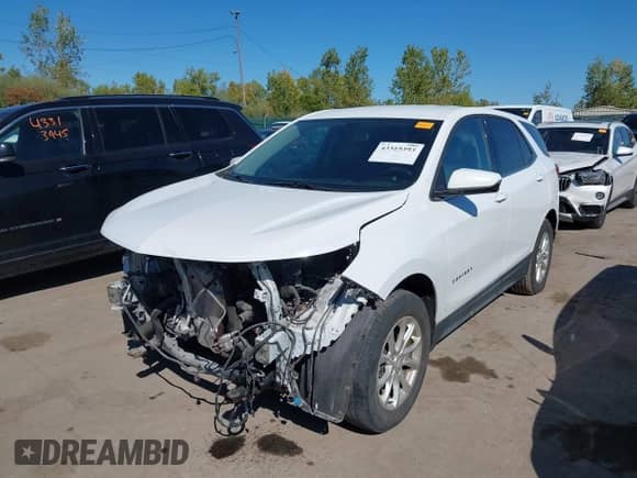 2018 Chevrolet Equinox LT with VIN 2GNAXJEV2J6115287, listed as a IAAI auction lot 43319393 with 123,394 mi miles and . Bid and sale history available at DreamBid. Image 2.