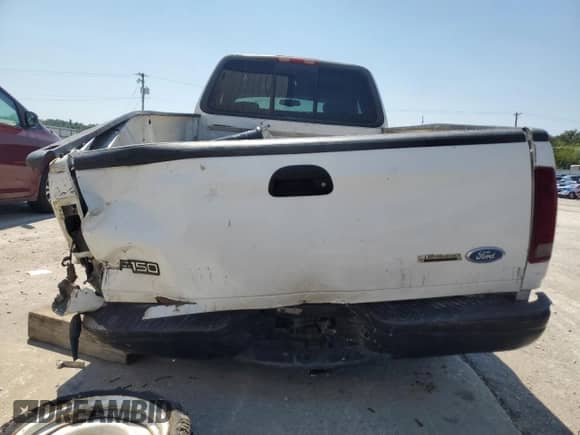 2000 Ford F-150 XL with VIN 1FTRX18L9YNB88412, listed as a Copart auction lot 69318865 with Not provided miles and Non repairable. Bid and sale history available at DreamBid. Image 6.