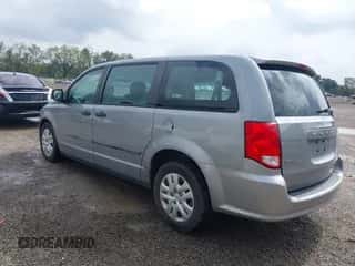 2014 Dodge Grand Caravan SE with VIN 2C4RDGBG7ER226869, listed as a IAAI auction lot 43312169 with 76,371 mi miles and . Bid and sale history available at DreamBid. Image 3.