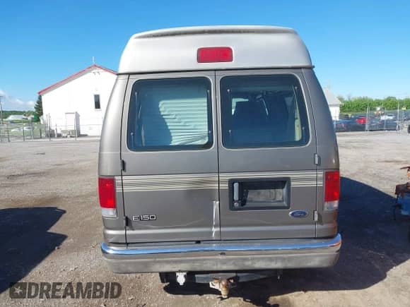 2003 Ford Econoline Cargo Recreational с VIN 1FDRE14L93HA06545, выставлен на аукционе IAAI как лот 42200611 с пробегом 160 671 миль миль и . История ставок и продаж доступна на DreamBid. Изображение 6.